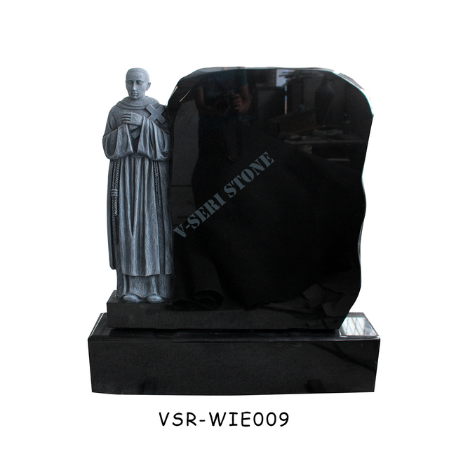 父の彫刻が施された天然黒御影石墓石